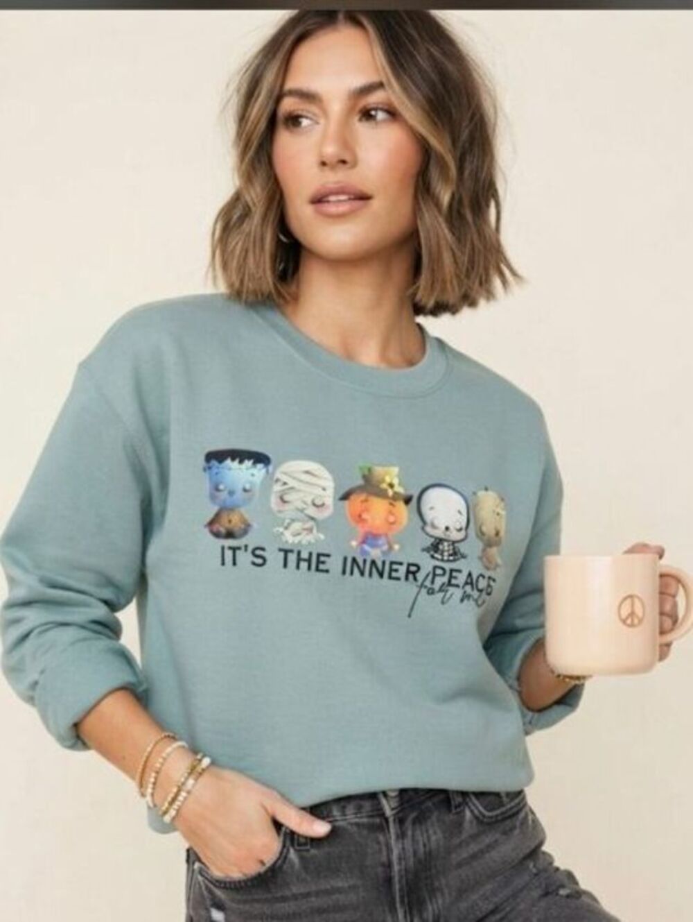 Whimsical Halloween character mediating sweatshirt